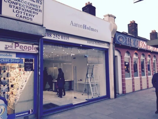 Commercial glass entrance with aluminium framing.