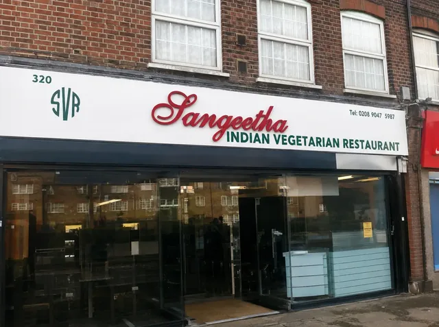 Full-width glazed restaurant shopfront and entrance doors.