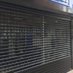 Roller shutter and gates provided by London City Group for secure aluminium and glass shopfronts.