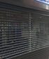 Roller shutter and gates provided by London City Group for secure aluminium and glass shopfronts.